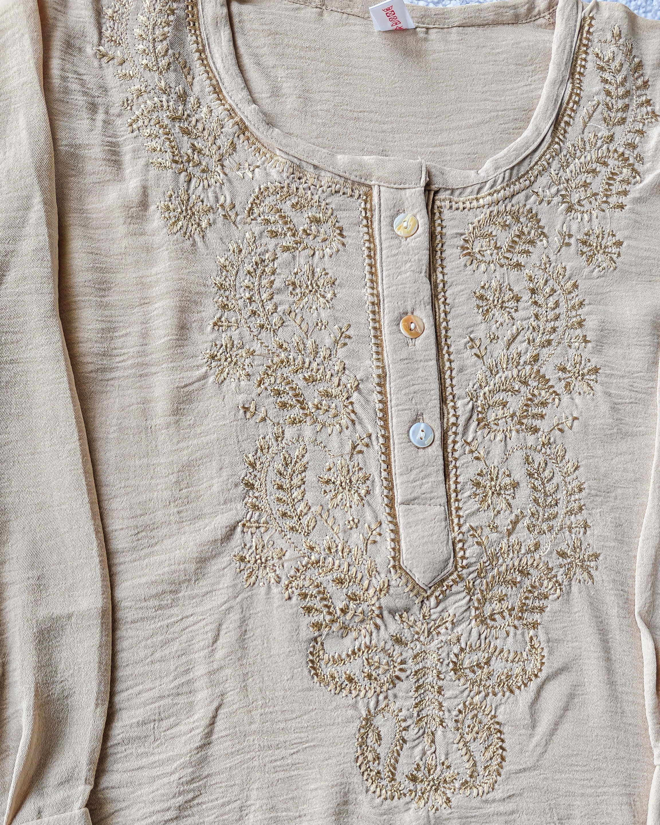 Beige georgette top with embroidery closeup