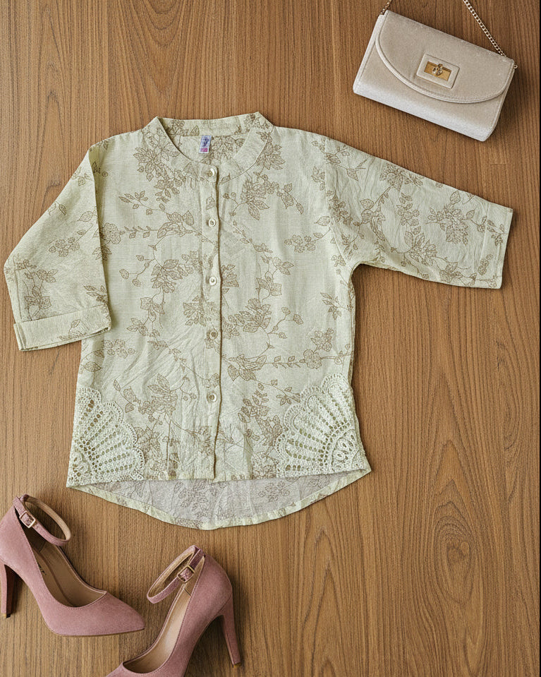 beige top with floral pattern