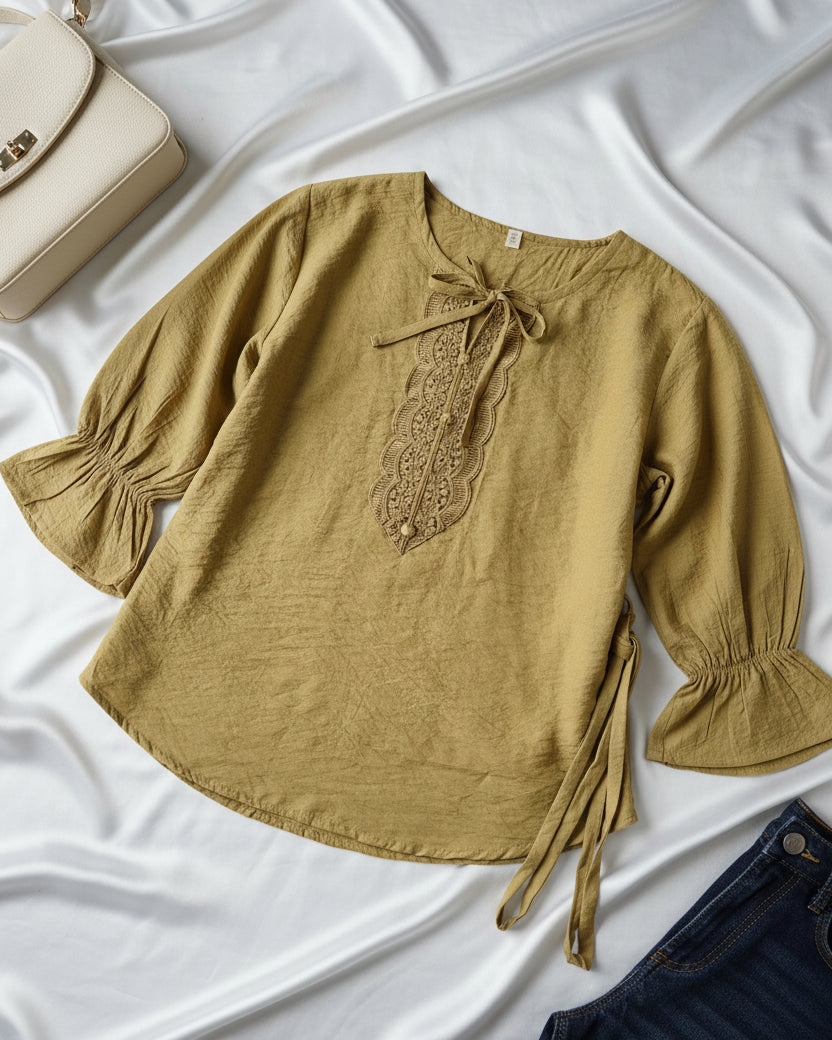 green belted women's top