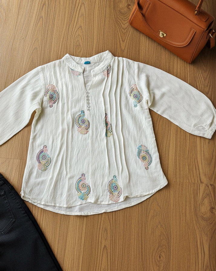 White blouse with colorful embroidery 