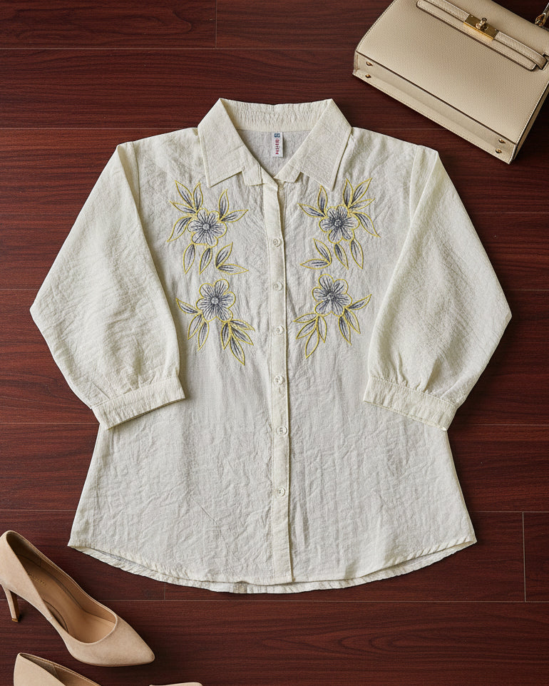 White blouse with floral embroidery 