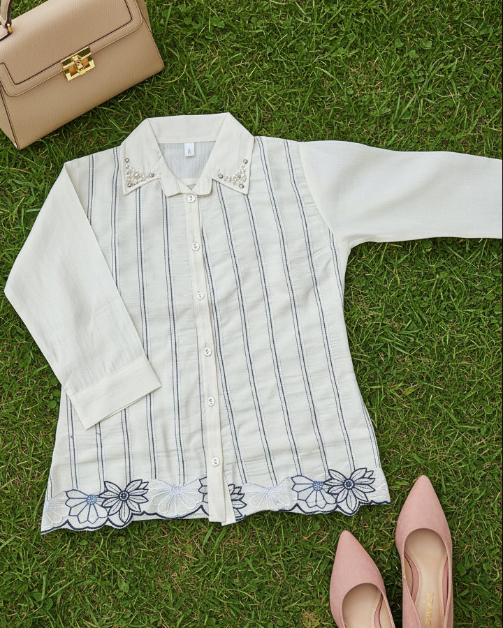 white striped women's shirt with floral detailing
