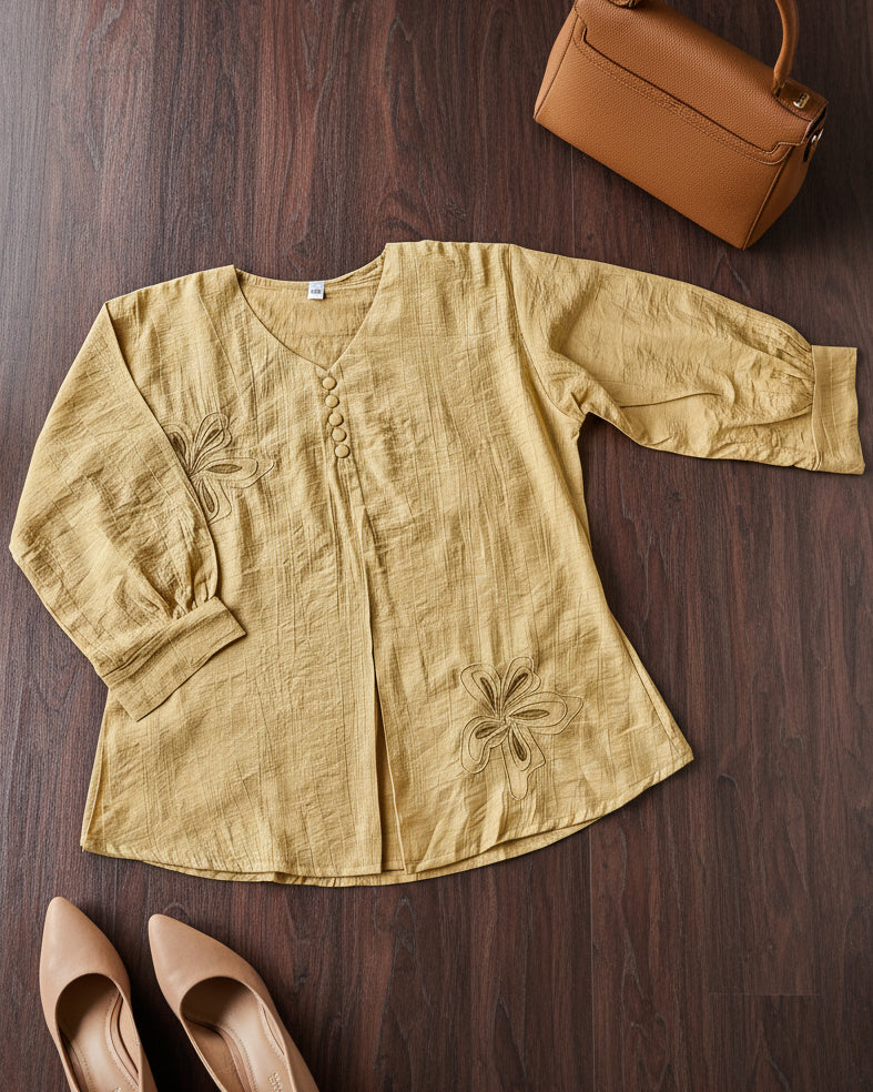 Yellow blouse with floral embroidery